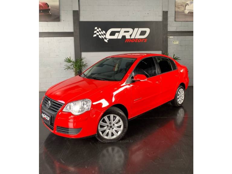 VOLKSWAGEN - POLO - 2009/2010 - Vermelha - R$ 38.900,00